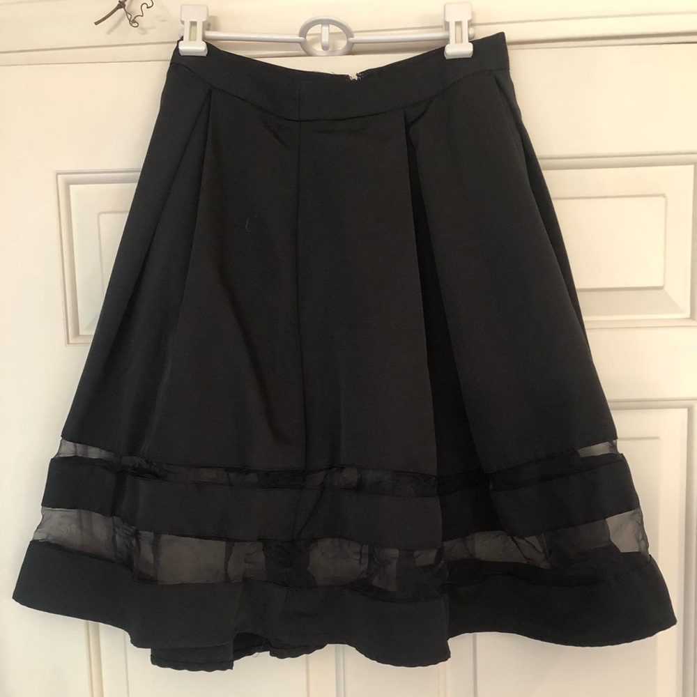 Midi-skirt with mess detailing